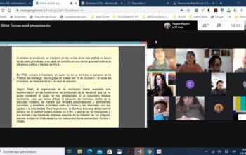 Google Meet screen: a shared document with Spanish text about the revolution, and a grid of participant thumbnails on the right side.